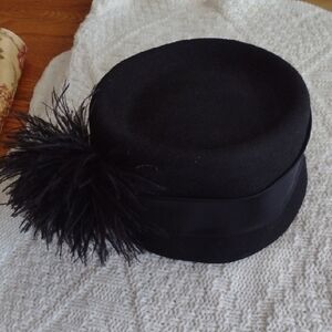 Chic Black Women's Hat with Feather Accent